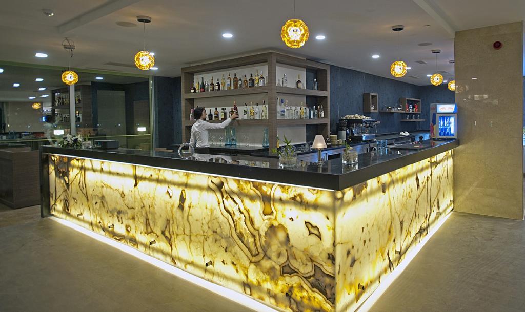 Cevahir Hotel Istanbul Asia Exterior photo A bar made of translucent stone